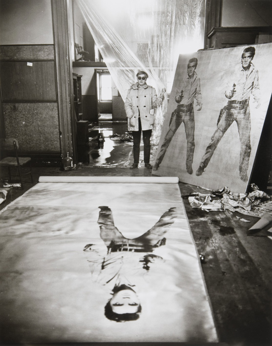 Evelyn Hofer, Andy Warhol (in his Studio with Elvis Presley Print), New York, 1965/2003